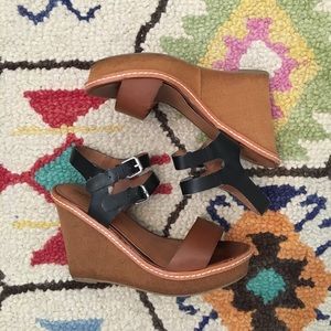 Brown and black faux leather wedges